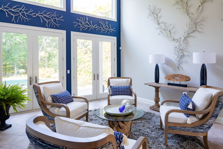 Blue and white seating area with nature inspired decor